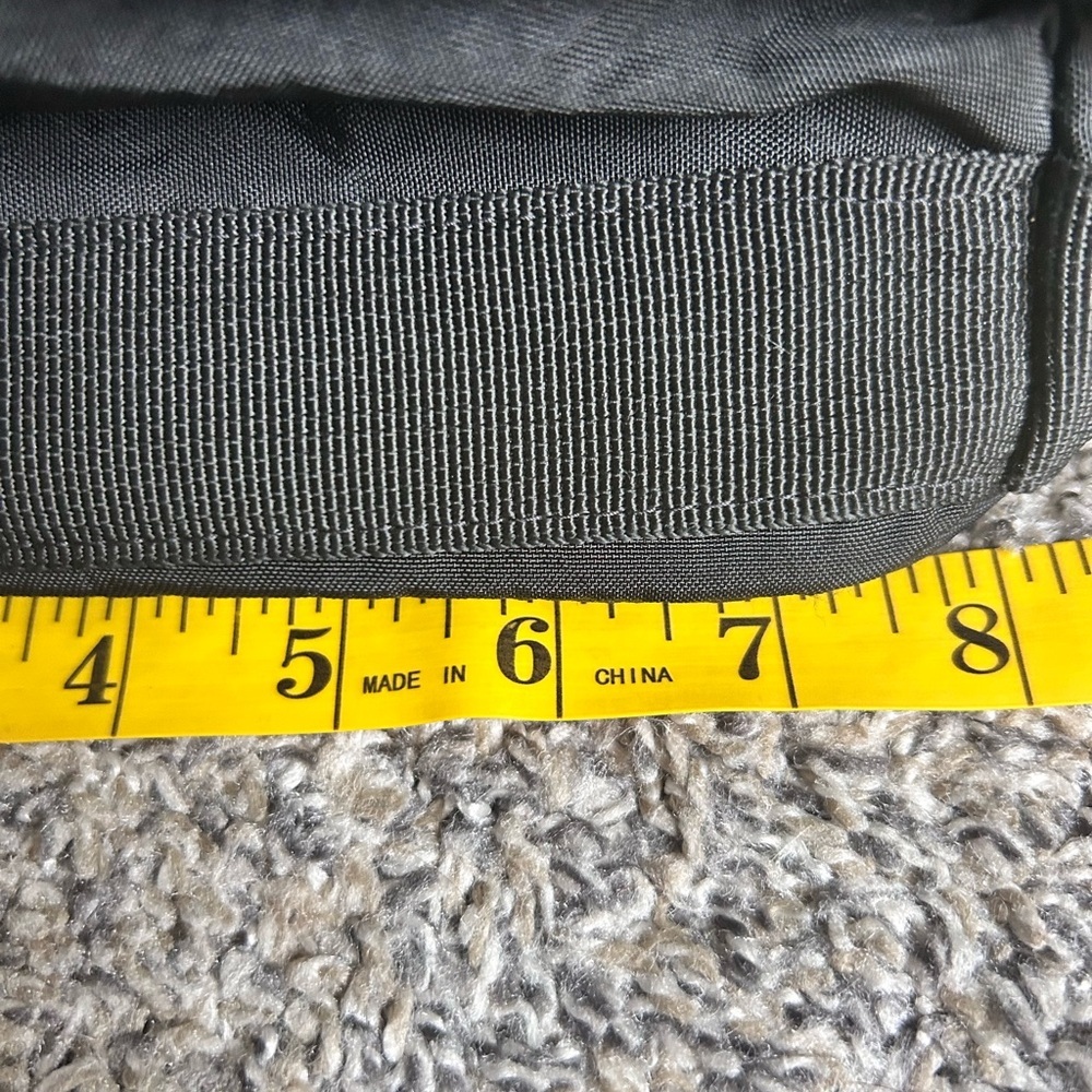 Tommy Bahama black travel duffle bag with hand and shoulder straps - Picture 9 of 10